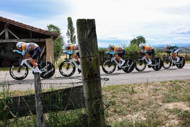 NSN Cycling Team's riders cycle during the 3rd stage of the Tour Auvergne-Rhone-Alpes cycling race (formerly known as the Criterium du Dauphine), 28,4km team time trial departing and arriving in Perreux, central France, on June 9, 2026. (Photo by Anne-Christine POUJOULAT / AFP)