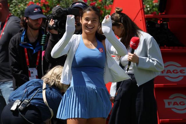 Britain's Emma Raducanu celebrates winning her round of 32, singles match at the HSBC WTA tennis Championships at Queen's Club in west London on June 9, 2026. Raducanu won the match 6-0, 6-3. (Photo by Adrian Dennis / AFP)