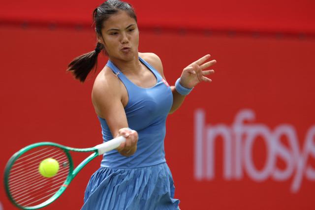 Britain's Emma Raducanu hits a forehand against Russia's Anna Blinkova during their round of 32, singles match at the HSBC WTA tennis Championships at Queen's Club in west London on June 9, 2026. (Photo by Adrian Dennis / AFP)