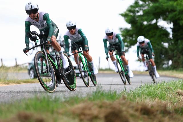 Caja Rural-Seguros RGA's team riders cycle during the 3rd stage of the Tour Auvergne-Rhone-Alpes cycling race (formerly known as the Criterium du Dauphine), 28,4km team time trial departing and arriving in Perreux central France, on June 9, 2026. (Photo by Anne-Christine POUJOULAT / AFP)