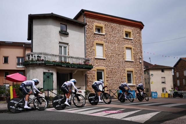Movistar Team riders cycle during the 3rd stage of the Tour Auvergne-Rhone-Alpes cycling race (formerly known as the Criterium du Dauphine), 28,4km team time trial departing and arriving in Perreux central France, on June 9, 2026. (Photo by Anne-Christine POUJOULAT / AFP)