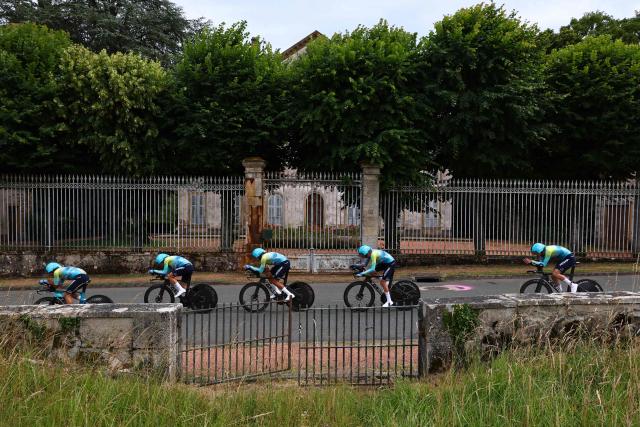 XDS Astana Team riders cycle during the 3rd stage of the Tour Auvergne-Rhone-Alpes cycling race (formerly known as the Criterium du Dauphine), 28,4km team time trial departing and arriving in Perreux central France, on June 9, 2026. (Photo by Anne-Christine POUJOULAT / AFP)