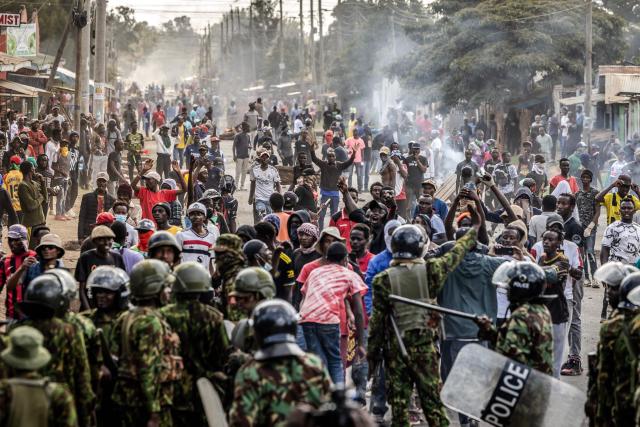 Demonstrators gather as they confront Kenyan police officers during clashes at a demonstration against a controversial US-built Ebola quarantine centre slated to begin operations at Laikipia Air Base in Nanyuki on June 9, 2026. Several Kenyans were arrested on June 9, 2026 in the latest protests against an Ebola quarantine centre being built for US citizens in a tourist town.
The centre at Laikipia Air Base in the town of Nanyuki, under the shadow of Mount Kenya, is set to quarantine Americans arriving from the Democratic Republic of Congo (DRC), which is battling a major Ebola outbreak. (Photo by Luis TATO / AFP)