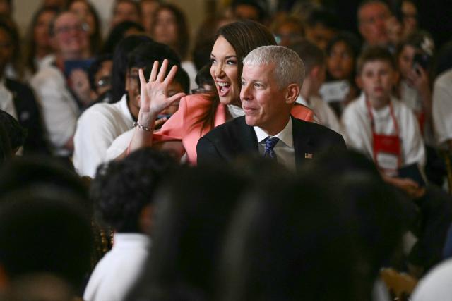 (From L) US Secretary of Agriculture Brooke Rollins and  US Secretary of Energy Chris Wright arrive during the Presidential Artificial Intelligence Challenge National Champion Awards Ceremony in the East Room of the White House in Washington, DC on June 9, 2026. (Photo by Brendan SMIALOWSKI / AFP)