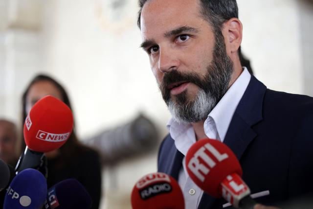 The lawyer of the parents of Lyhanna, Francois Roujou de Boubee  talks to journalists following the killing of the 11-year-old girl in Fleurance, on June 9, 2026. The body of Lyhanna, was found last week after she went missing on May 29 near the southwestern town of Fleurance. Justice Minister apologised for what he called a "huge failure" in the handling of previous accusations against the suspect, the father of a school friend of the victim, who had been twice formally accused of raping a child. (Photo by Valentine CHAPUIS / AFP)