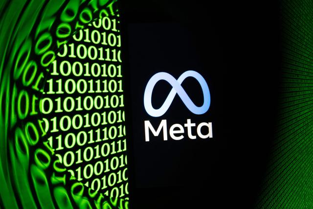 (FILES) This illustration photograph shows the logo of the US multinational technology Meta company displayed on a smartphone in Mulhouse, eastern France on February 11, 2026. The EU ordered Meta on June 9, 2026 to give rival AI chatbots access to its WhatsApp platform for free within five working days as it carries out an antitrust probe, or risk a heavy fine. (Photo by SEBASTIEN BOZON / AFP)