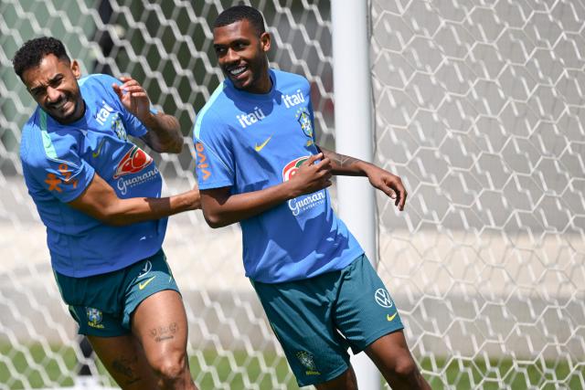 Brazil's defender Danilo (L) and forward Rayan smile during a training session as part of the team's preparation for its FIFA World Cup football tournament opening match against Morocco at Columbia Park Training Facility in Morristown, New Jersey on June 9, 2026. (Photo by MAURO PIMENTEL / AFP)