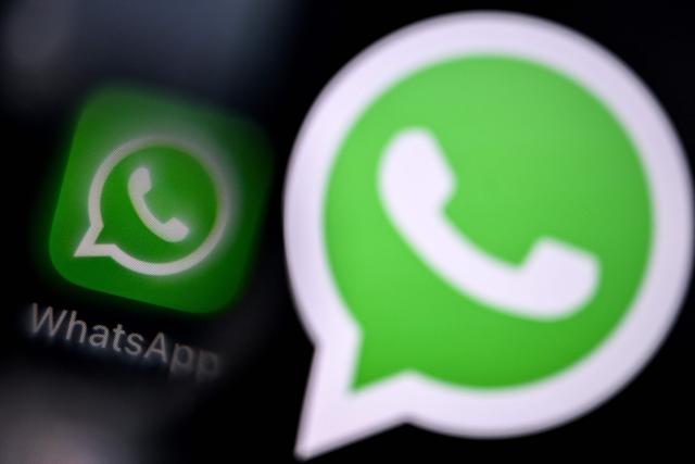 (FILES) This illustration photograph taken on December 1, 2025, shows the logo of US instant messaging software Whatsapp displayed on a smartphone's screen, in Frankfurt am Main, western Germany. The EU ordered Meta on June 9, 2026 to give rival AI chatbots access to its WhatsApp platform for free within five working days as it carries out an antitrust probe, or risk a heavy fine. (Photo by Kirill KUDRYAVTSEV / AFP)