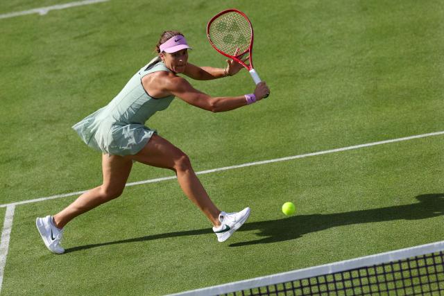 Germany's Tatjana Maria returns the ball against Greece's Maria Sakkari during their round of 32, singles match at the HSBC WTA tennis Championships at Queen's Club in west London on June 9, 2026. (Photo by Adrian Dennis / AFP)