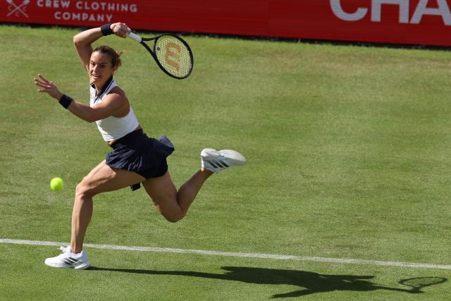 Greece's Maria Sakkari hits a forehand against Germany's Tatjana Maria during their round of 32, singles match at the HSBC WTA tennis Championships at Queen's Club in west London on June 9, 2026. (Photo by Adrian Dennis / AFP)