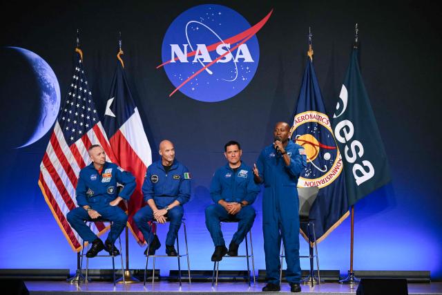 (L/R) NASA astronaut commander Randy Bresnik, ESA (European Space Agency) astronaut pilot Luca Parmitano, NASA astronaut mission specialist Frank Rubio, and NASA astronaut mission specialist Andre Douglas speak during a press conference announcing the crew for the Artemis III mission at NASA's Johnson Space Center in Houston, Texas, on June 9, 2026. The Italian Luca Parmitano will be the pilot of NASA's Artemis 3 voyage, the first European to join one of the program's missions. Parmitano, who will represent the European Space Agency, is one of four men named as crewmembers tasked with carrying out Artemis 3, which is targeting launch in late 2027. (Photo by RONALDO SCHEMIDT / AFP)