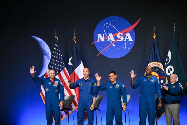 (L/R) NASA astronaut commander Randy Bresnik, ESA (European Space Agency) astronaut pilot Luca Parmitano, NASA astronaut mission specialist Frank Rubio, and NASA astronaut mission specialist Andre Douglas speak during a press conference announcing the crew for the Artemis III mission at NASA's Johnson Space Center in Houston, Texas, on June 9, 2026. The Italian Luca Parmitano will be the pilot of NASA's Artemis 3 voyage, the first European to join one of the program's missions. Parmitano, who will represent the European Space Agency, is one of four men named as crewmembers tasked with carrying out Artemis 3, which is targeting launch in late 2027. (Photo by RONALDO SCHEMIDT / AFP)