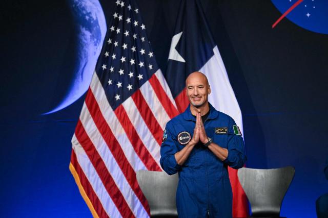 ESA (European Space Agency) astronaut pilot Luca Parmitano gestures during a press conference announcing the crew for the Artemis III mission at NASA's Johnson Space Center in Houston, Texas, on June 9, 2026. The Italian Luca Parmitano will be the pilot of NASA's Artemis 3 voyage, the first European to join one of the program's missions. Parmitano, who will represent the European Space Agency, is one of four men named as crewmembers tasked with carrying out Artemis 3, which is targeting launch in late 2027. (Photo by RONALDO SCHEMIDT / AFP)