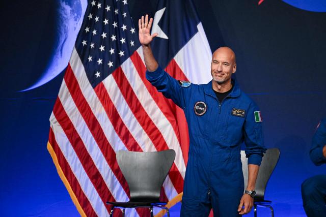 TOPSHOT - ESA (European Space Agency) astronaut pilot Luca Parmitano gestures during a press conference announcing the crew for the Artemis III mission at NASA's Johnson Space Center in Houston, Texas, on June 9, 2026. The Italian Luca Parmitano will be the pilot of NASA's Artemis 3 voyage, the first European to join one of the program's missions. Parmitano, who will represent the European Space Agency, is one of four men named as crewmembers tasked with carrying out Artemis 3, which is targeting launch in late 2027. (Photo by RONALDO SCHEMIDT / AFP)