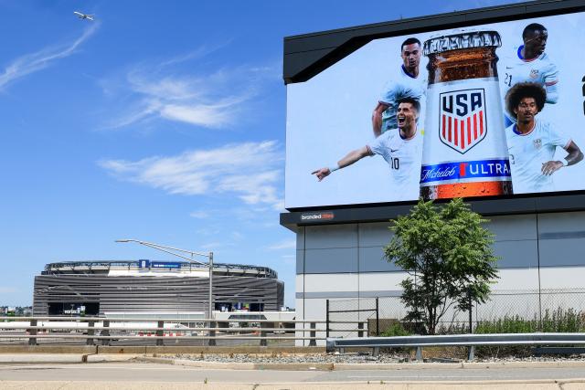 A billboard featuring members of the US national team stands near the New York New Jersey Stadium (temporarily renamed from MetLife Stadium) ahead of the 2026 FIFA World Cup in East Rutherford, New Jersey, on June 9, 2026. (Photo by TIMOTHY A. CLARY / AFP)