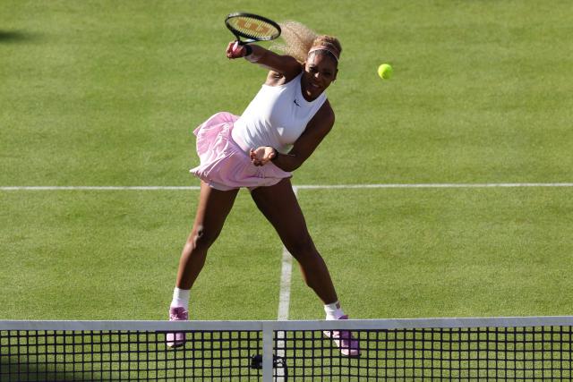 US player Serena Williams returns while playing with Canada's Victoria Mboko against US player Nicole Melichar-Martinez and New Zealand's Erin Routliffe during their round of 16, doubles match at the HSBC WTA tennis Championships at Queen's Club in west London on June 9, 2026. (Photo by Adrian Dennis / AFP)