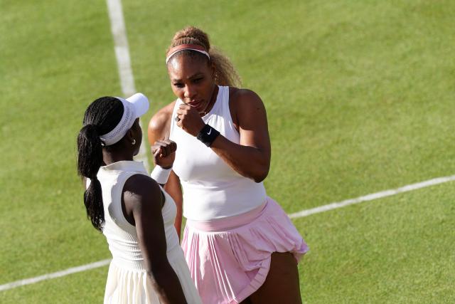 US player Serena Williams (R) strategizes with Canada's Victoria Mboko (L) during their match against US player Nicole Melichar-Martinez and New Zealand's Erin Routliffe during their round of 16, doubles match at the HSBC WTA tennis Championships at Queen's Club in west London on June 9, 2026. (Photo by Adrian Dennis / AFP)