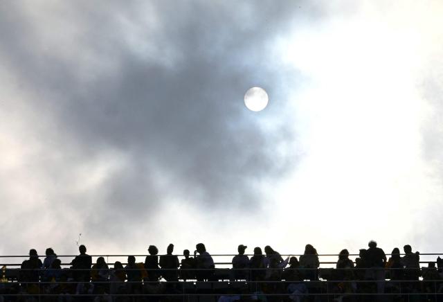 The sun is pictured as faithfuls wait prior a prayer vigil at the Lluis Companys Olympic Stadium in Barcelona, on June 9, 2026. Pope Leo XIV is visiting Spain June 6-12 with stops in Madrid, Barcelona, and the Canary Islands, where he will meet with migrants and organisations dedicated to helping them. (Photo by Stefano RELLANDINI / AFP)