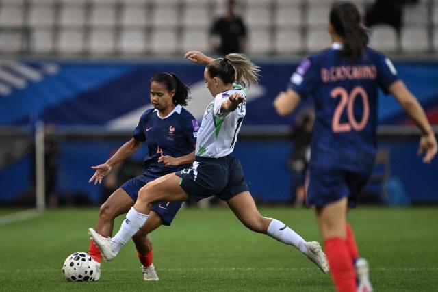 France's defender #04 Alice Sombath (L) fights for the ball with Republic of Ireland's forward #11 Katie McCabe (R) during the FIFA Women's World Cup Europe Zone Qualifiers League A Group 2 football match between France and Republic of Ireland at the "Stade des Alpes" stadium, Grenoble, central-eastern France, on June 9, 2026 (Photo by JEFF PACHOUD / AFP)