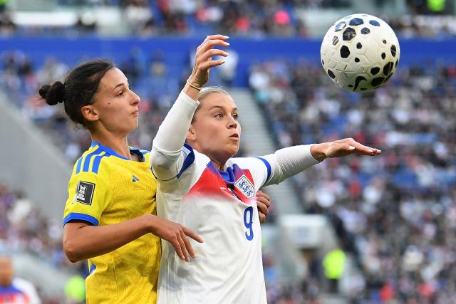 Ukraine's defender #21 Lesia Olkhova (L) vies with England's striker #09 Alessia Russo (R) during the Women's 2027 World Cup European Qualifiers, league A, group 3, football match between England and Ukraine at the Hill Dickinson Stadium in Liverpool, north west England, on June 9, 2026. (Photo by PETER POWELL / AFP)