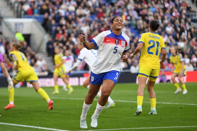 England's defender #05 Jess Carter celebrates after scoring the opening goal during the Women's 2027 World Cup European Qualifiers, league A, group 3, football match between England and Ukraine at the Hill Dickinson Stadium in Liverpool, north west England, on June 9, 2026. (Photo by PETER POWELL / AFP)
