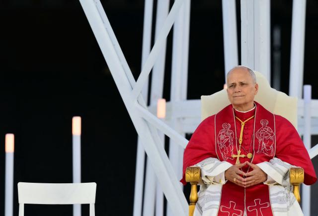 Pope Leo XIV attends a prayer vigil at the Lluis Companys Olympic Stadium in Barcelona, on June 9, 2026. Pope Leo XIV is visiting Spain June 6-12 with stops in Madrid, Barcelona, and the Canary Islands, where he will meet with migrants and organisations dedicated to helping them. (Photo by Stefano RELLANDINI / AFP)