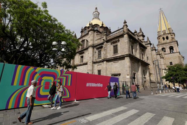 People walk at the “FIFA Fan Fest Guadalajara” installation at Plaza Liberacion and Plaza de Armas in downtown Guadalajara, Jalisco State, Mexico, on June 9, 2026, ahead of the 2026 FIFA World Cup football tournament. (Photo by Ulises Ruiz / AFP)