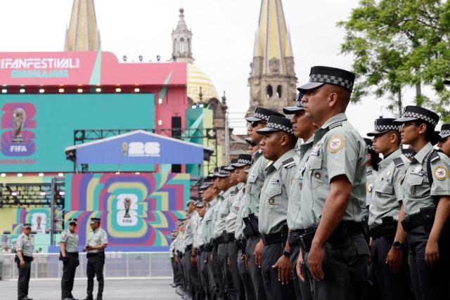 National Guard members stand guard at the “FIFA Fan Fest Guadalajara” installation at Plaza Liberacion and Plaza de Armas in downtown Guadalajara, Jalisco State, Mexico, on June 9, 2026, ahead of the 2026 FIFA World Cup football tournament. (Photo by Ulises Ruiz / AFP)