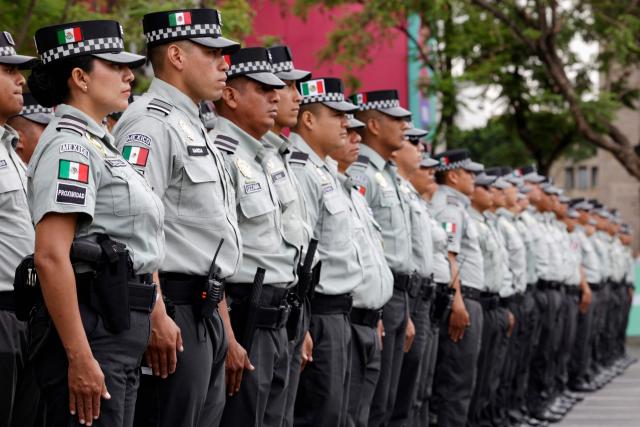 National Guard members stand guard at the “FIFA Fan Fest Guadalajara” installation at Plaza Liberacion and Plaza de Armas in downtown Guadalajara, Jalisco State, Mexico, on June 9, 2026, ahead of the 2026 FIFA World Cup football tournament. (Photo by Ulises Ruiz / AFP)