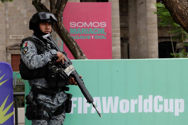 A National Guard member stands guard at the “FIFA Fan Fest Guadalajara” installation at Plaza Liberacion and Plaza de Armas in downtown Guadalajara, Jalisco State, Mexico, on June 9, 2026, ahead of the 2026 FIFA World Cup football tournament. (Photo by Ulises Ruiz / AFP)