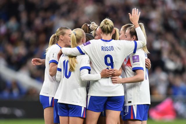 England's striker #19 Beth Mead celebrates with teammates after scoring their third goal during the Women's 2027 World Cup European Qualifiers, league A, group 3, football match between England and Ukraine at the Hill Dickinson Stadium in Liverpool, north west England, on June 9, 2026. (Photo by PETER POWELL / AFP)