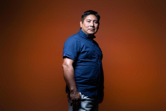 An officer of the Amazonian Park of French Guiana Tapinkili Anaiman, poses during a photo session in Paris on June 9, 2026. (Photo by JOEL SAGET / AFP)