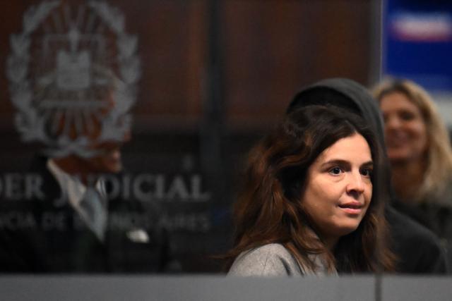 Dalma Maradona, daughter of late Argentine football legend Diego Maradona, leaves the court after a hearing in the trial into her father’s death, in San Isidro, Buenos Aires province, Argentina, on June 9, 2026. (Photo by Luis ROBAYO / AFP)