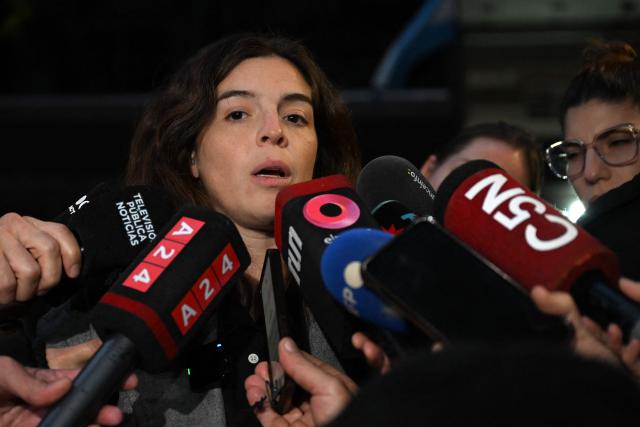 Dalma Maradona, daughter of late Argentine football legend Diego Maradona, speaks to the media outside the courthouse after a hearing in the trial into her father’s death, in San Isidro, Buenos Aires province, Argentina, on June 9, 2026. (Photo by Luis ROBAYO / AFP)