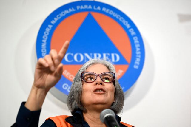 Guatemala's executive secretary of the National Coordination for Disaster Reduction (CONRED), Claudinne Ogaldes, speaks during a press conference before the arrival of storm Cristina in Guatemala City on June 9, 2026. Ogaldes stated that although the country will not experience a “direct impact,” they do expect “a large amount of rainfall, rising rivers, flooding, landslides” and possible "damage to infrastructure". (Photo by Johan ORDONEZ / AFP)