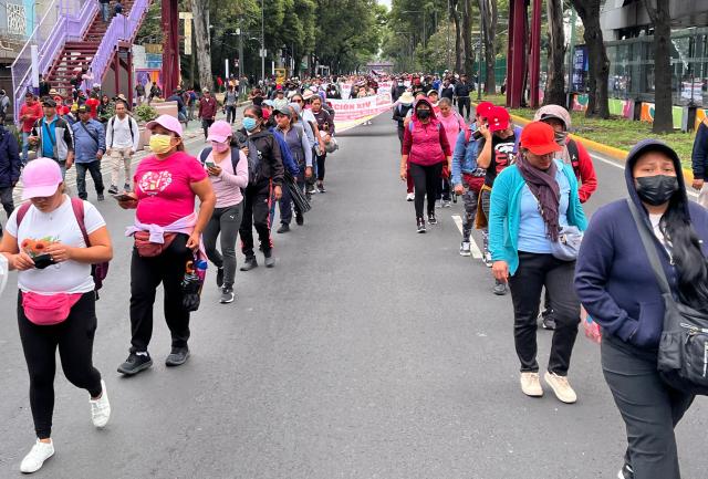 Teachers and studens from Ayotzinapa school march to the Ciudad de Mexico Stadium in Mexico City on June 9, 2026. Thousands of teachers blocked an avenue leading to the Azteca Stadium in Mexico City, 48 hours before the opening ceremony of the 2026 World Cup at that venue. (Photo by Gerardo Magallon / AFP)
