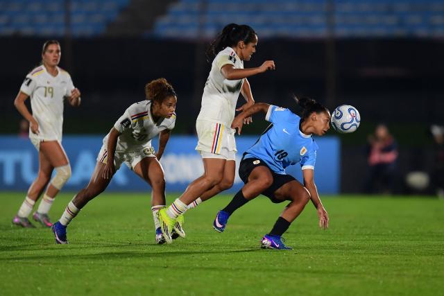 Venezuela's forward #11 Enyer Higuera and Uruguay's forward #19 Wendy Carballo fight for the ball during the CONMEBOL Nations League Women football match between Uruguay and Venezuela at the Centenario stadium in Montevideo on June 9, 2026. (Photo by Dante FERNANDEZ / AFP)