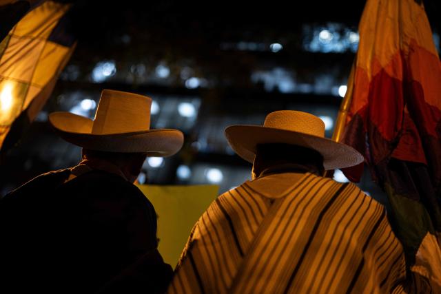 Supporters of Peru's presidential candidate Roberto Sanchez, for the Juntos por el Peru party, protest in front of the National Election Jury (JNE) in Lima on June 9, 2026. The head of Peru's election authority told AFP that the results of the June 7 presidential election may not be known for up to two weeks, dashing hopes of a swift resolution to the ultra-tight race. (Photo by ERNESTO BENAVIDES / AFP)