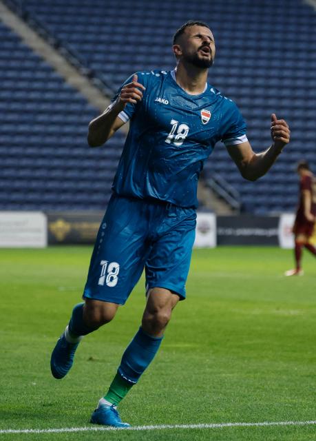 Iraq's forward #18 Aymen Hussein reacts during the international friendly football match between Iraq and Venezuela at SeatGeek Stadium in Bridgeview, Illinois on June 9, 2026. (Photo by KAMIL KRZACZYNSKI / AFP)
