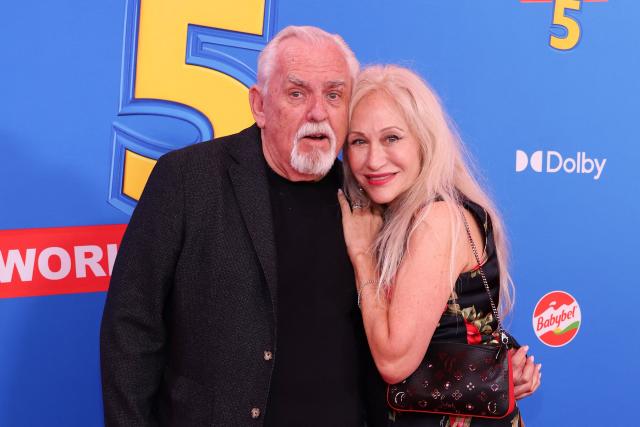 US actor John Ratzenberger and his wife Julie Blichfeldt attend Disney and Pixar's "Toy Story 5" premiere at the Dolby Theatre in Los Angeles on June 9, 2026. (Photo by VALERIE MACON / AFP)