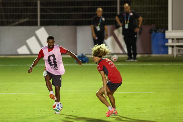 Tunisia's forward Firas Chaouat (L) and teammate midfielder Hannibal Mejbri take part in a training session at Rayados Training Centre in Santiago, Nuevo Leon state, Mexico on June 9, 2026, ahead of the 2026 World Cup football tournament. (Photo by Julio Cesar AGUILAR / AFP)