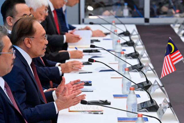 Malaysia's Prime Minister Anwar Ibrahim speaks with Japan's Prime Minister Sanae Takaichi (not seen) during a bilateral meeting at the Prime Minister’s Office in Tokyo on June 10, 2026. (Photo by David Mareuil / POOL / AFP)