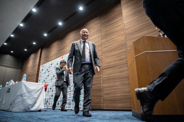 Japan's national rugby union team head coach Eddie Jones leaves after a press conference in Tokyo on June 10, 2026. (Photo by Yuichi YAMAZAKI / AFP)