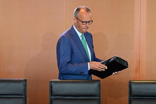 Germany's Chancellor Friedrich Merz arrives for the weekly cabinet meeting at the Chancellery in Berlin on June 10, 2026. (Photo by John MACDOUGALL / AFP)