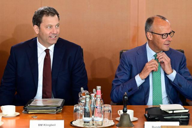German Finance Minister and Vice Chancellor Lars Klingbeil and Germany's Chancellor Friedrich Merz take their seat prior to the weekly cabinet meeting at the Chancellery in Berlin on June 10, 2026. (Photo by John MACDOUGALL / AFP)
