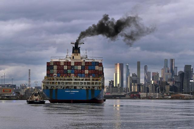 The 280-metre-long Cosco Hong Kong container ship enters the Port of Melbourne, Australia's largest container port, in Melbourne on June 10, 2026. (Photo by William WEST / AFP)