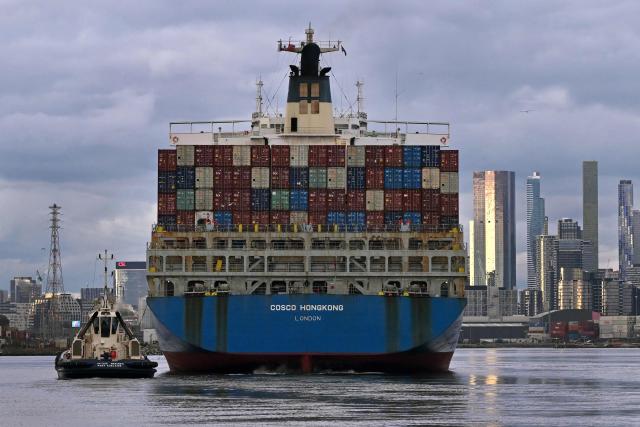 The 280-metre-long Cosco Hong Kong container ship enters the Port of Melbourne, Australia's largest container port, in Melbourne on June 10, 2026. (Photo by William WEST / AFP)