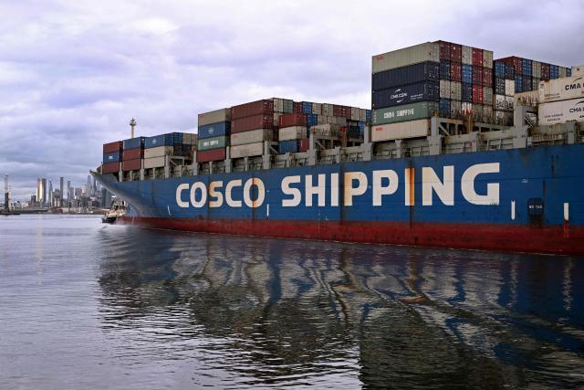 The 280-metre-long Cosco Hong Kong container ship enters the Port of Melbourne, Australia's largest container port, in Melbourne on June 10, 2026. (Photo by William WEST / AFP)