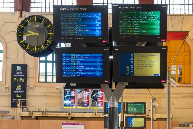 This photograph shows screens indicating departure and arrival times as well as disruptions due to a SNCF national strike movement at the Saint-Charles train station in Marseille, southern France, on June 10, 2026. Some TGV high-speed trains are cancelled on June 10, morning, as well as regional and suburban trains, which are increasingly open to competition, as part of a 24-hour strike organized by SNCF unions. Traffic on June 10 morning is in line with forecasts, SNCF Voyageurs told AFP: regional traffic—the “everyday trains”—is “severely disrupted,” and on long-distance routes an average of one in three TGVs has been cancelled, along with one in two Intercitйs trains. (Photo by MIGUEL MEDINA / AFP)