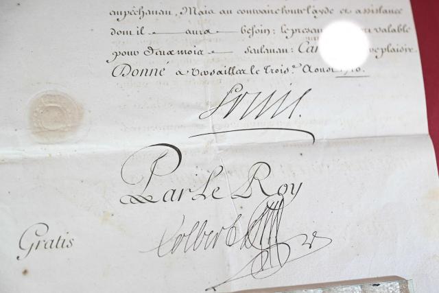 This photograph taken on June 5, 2026 shows a close view of a manuscript diplayed during a press preview as part of the exhibition "Atto Melani (16261714). The Secret Voice of Power," at the Labronica Library of Villa Fabbricotti in Livorno on June 5, 2026. A celebrated singer in the courts of Tuscany, Venice, Rome, and France, a protégé of Cardinal Mazarin and close associate of the Sun King, Louis XIV of France, Atto Melani transformed his theatrical success into an extraordinary diplomatic career. Castrated as a child, he constantly struggled between public prestige and the human burden of his condition, yet he managed to become a political mediator, informer, and protagonist in the conclaves that marked the history of the papacy between 1667 and 1700. (Photo by Andreas SOLARO / AFP)